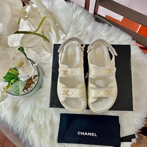 chanel white flat sandals.